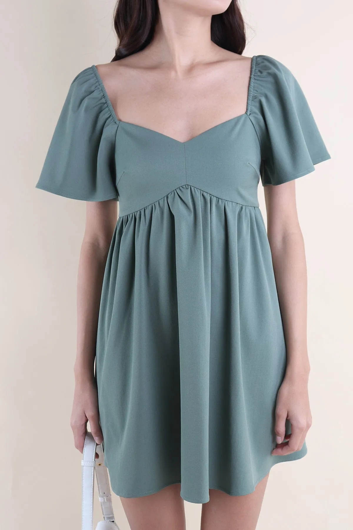 FIOERA FLUTTERS DRESS IN GREEN