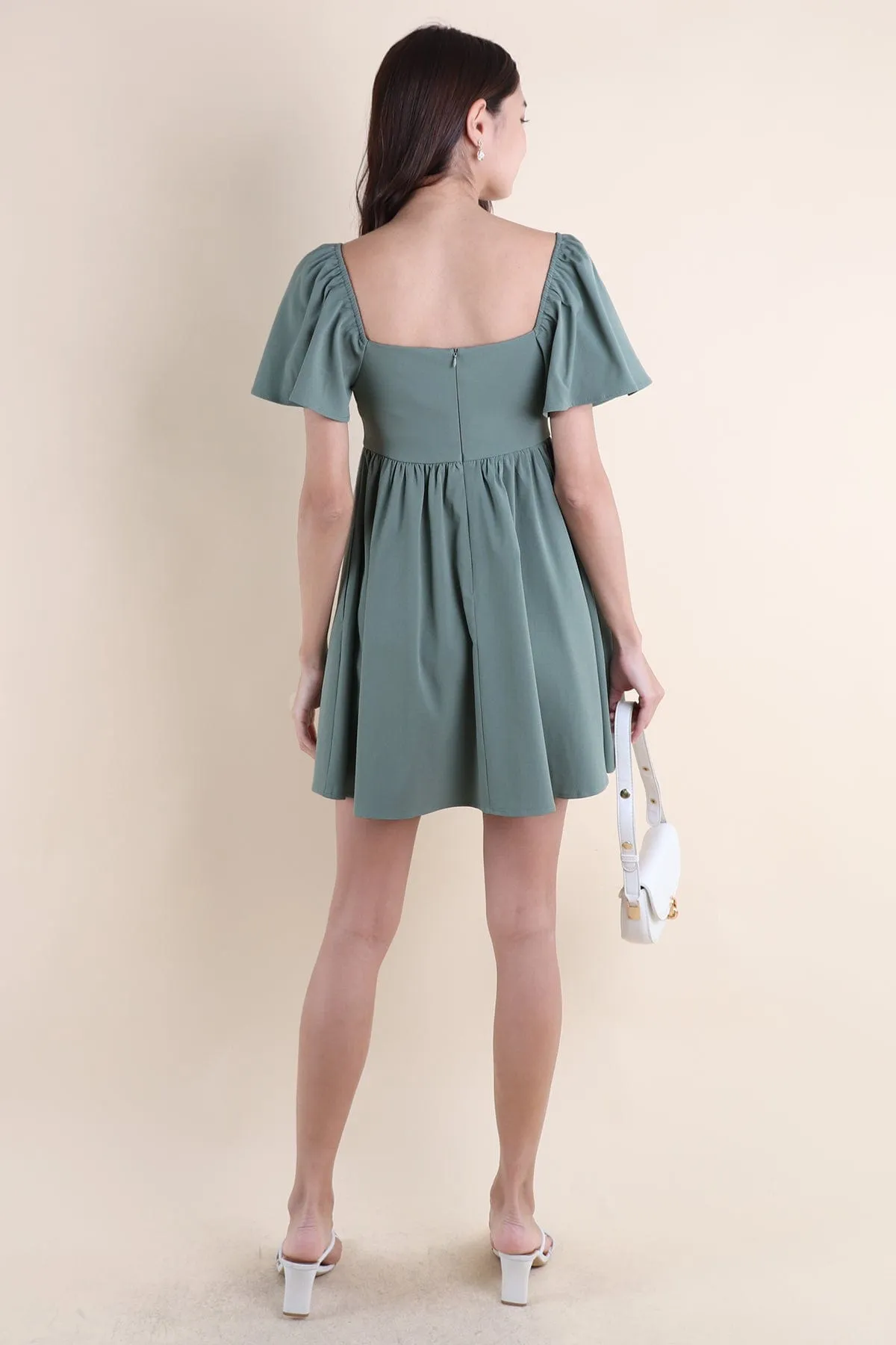 FIOERA FLUTTERS DRESS IN GREEN