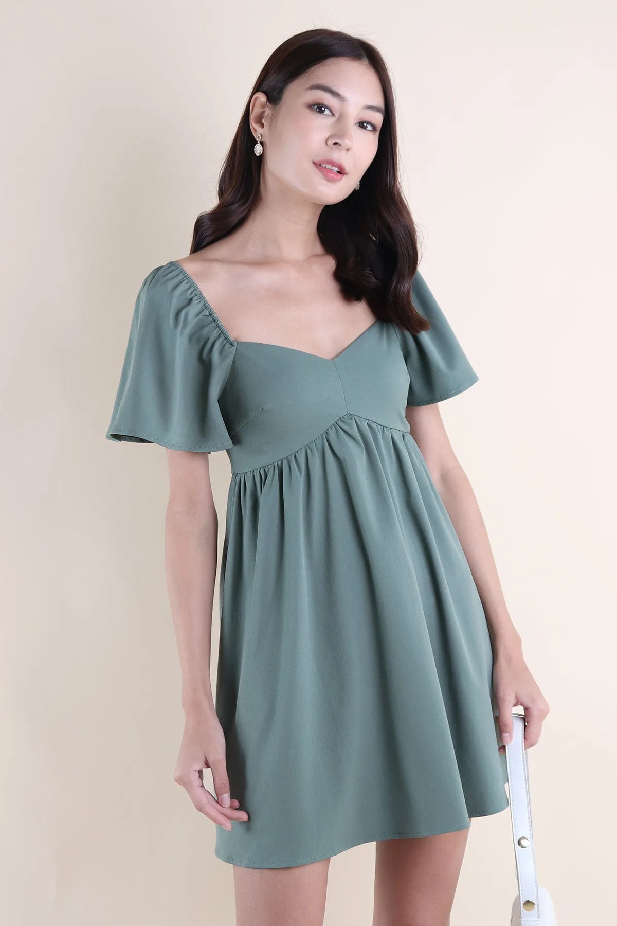 FIOERA FLUTTERS DRESS IN GREEN