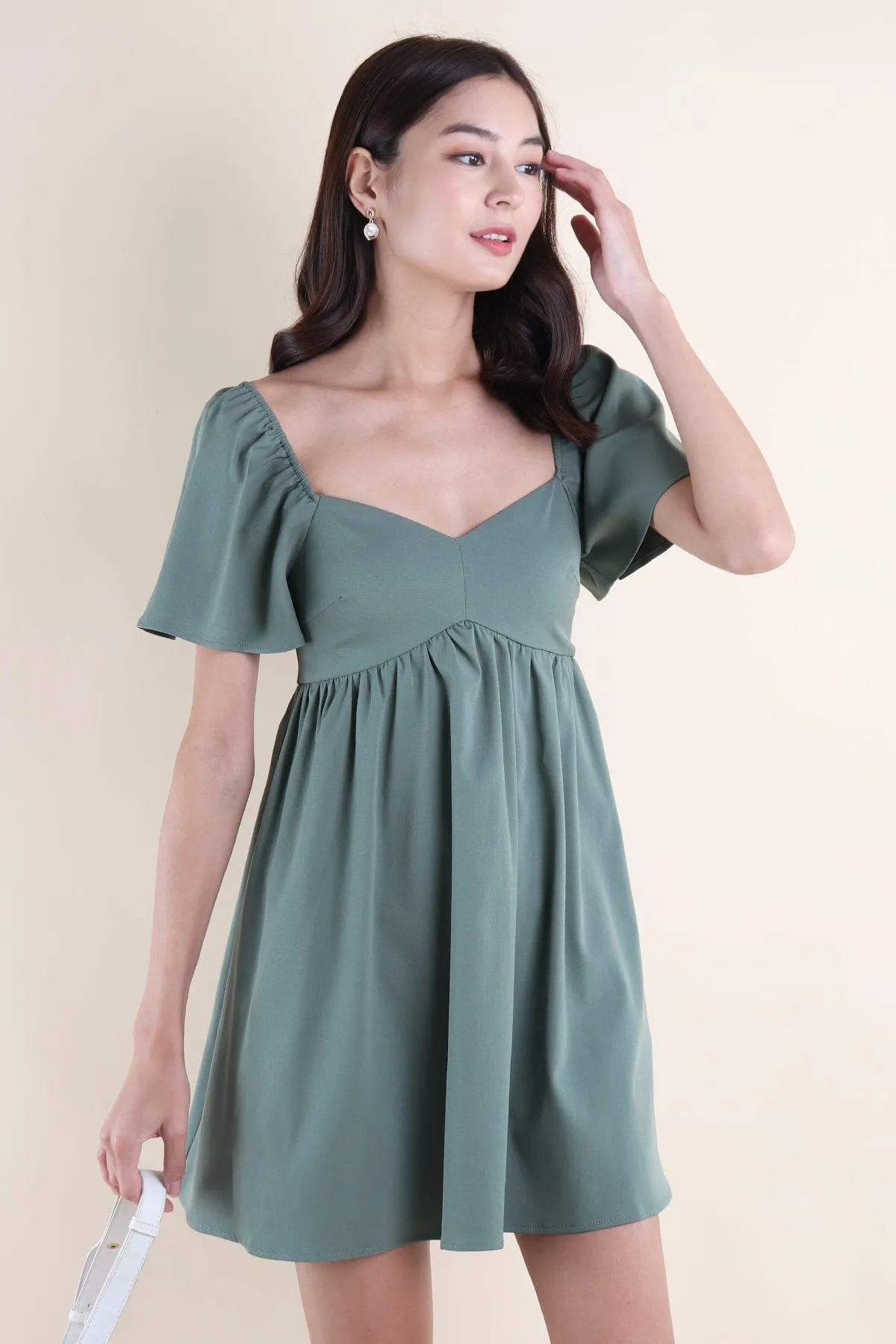FIOERA FLUTTERS DRESS IN GREEN