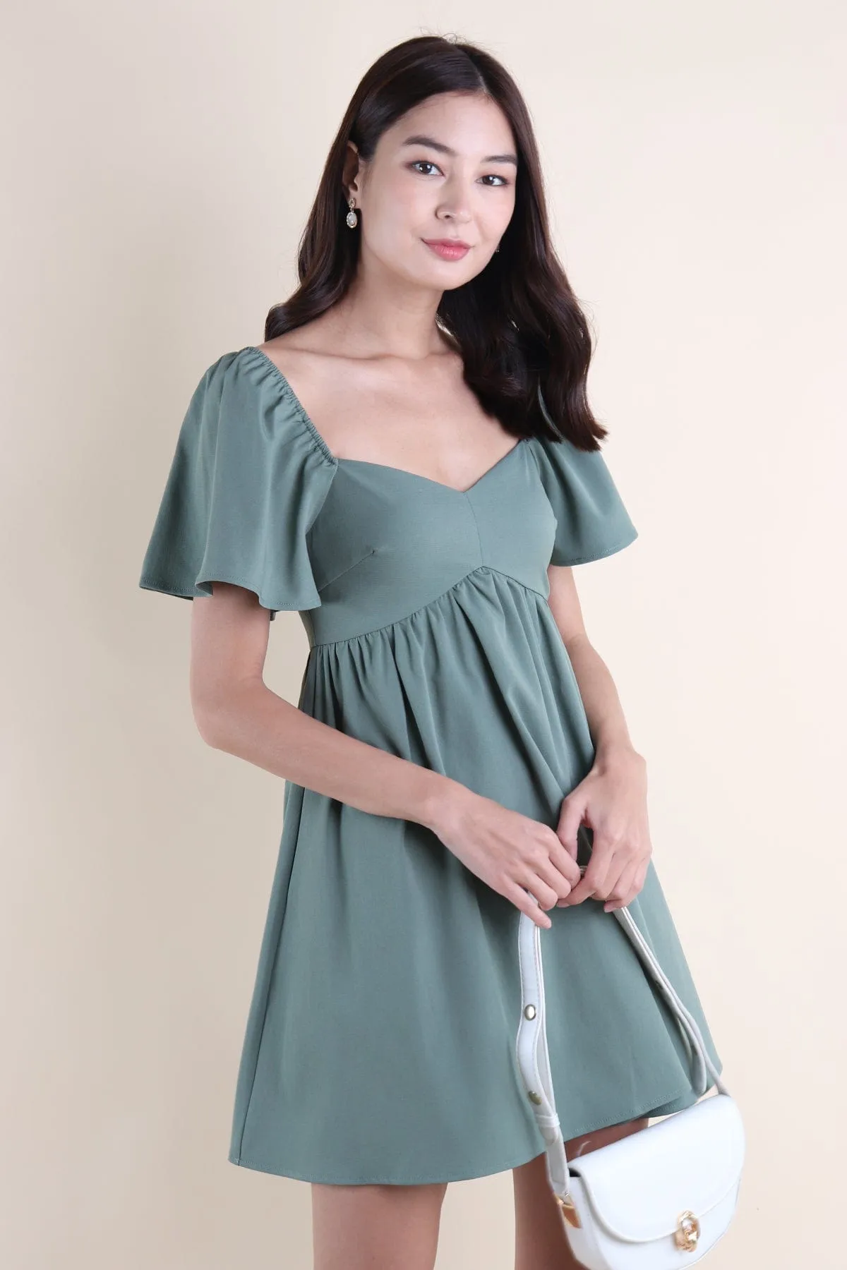 FIOERA FLUTTERS DRESS IN GREEN